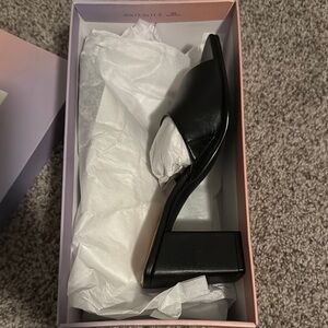 Sophisticated Black High Heeled Pumps